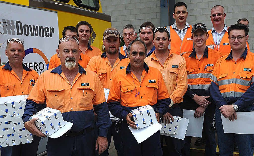Workers from Downer EDI received awards for their commitment to the company at the Bowen St facility yesterday. Workers from Downer EDI received awards for their commitment to the company at the Bowen St facility yesterday.